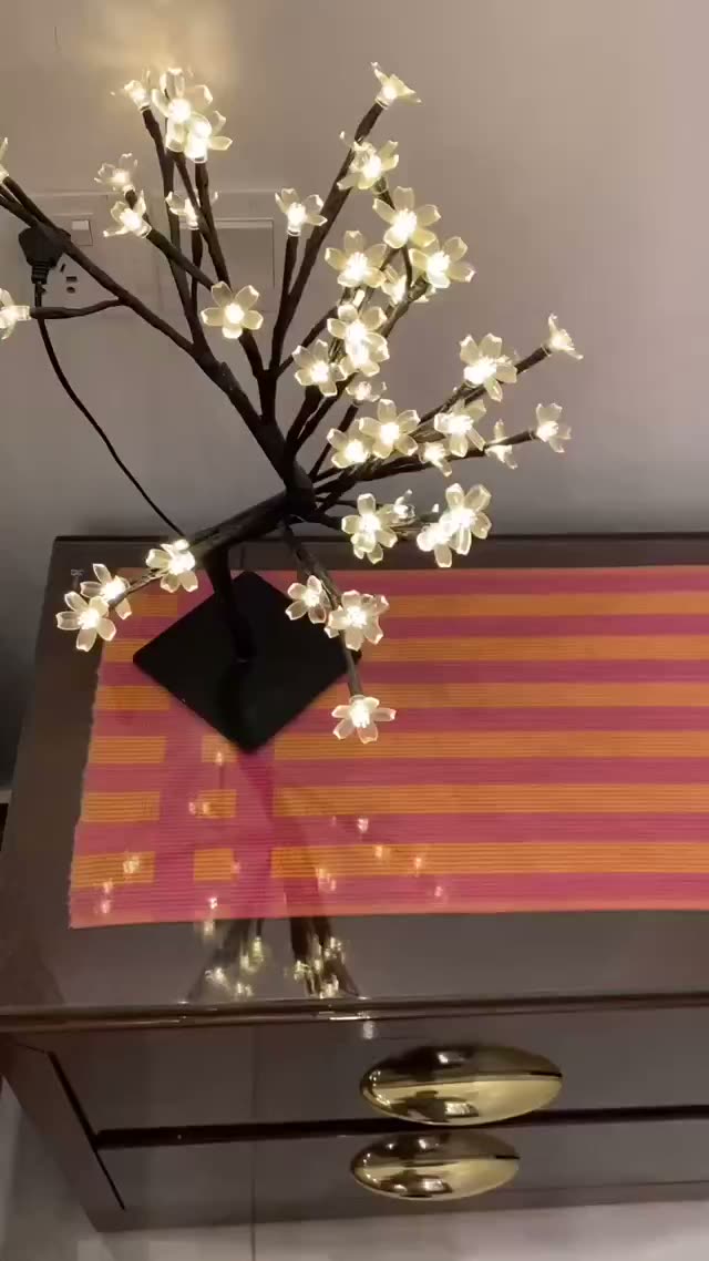 Side table with a blossom lamp