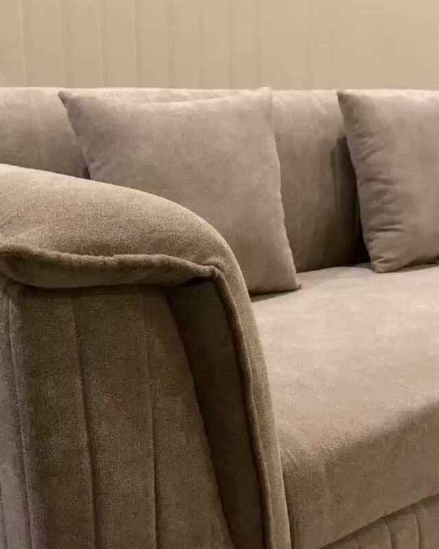 Channel sofa in stone fabric